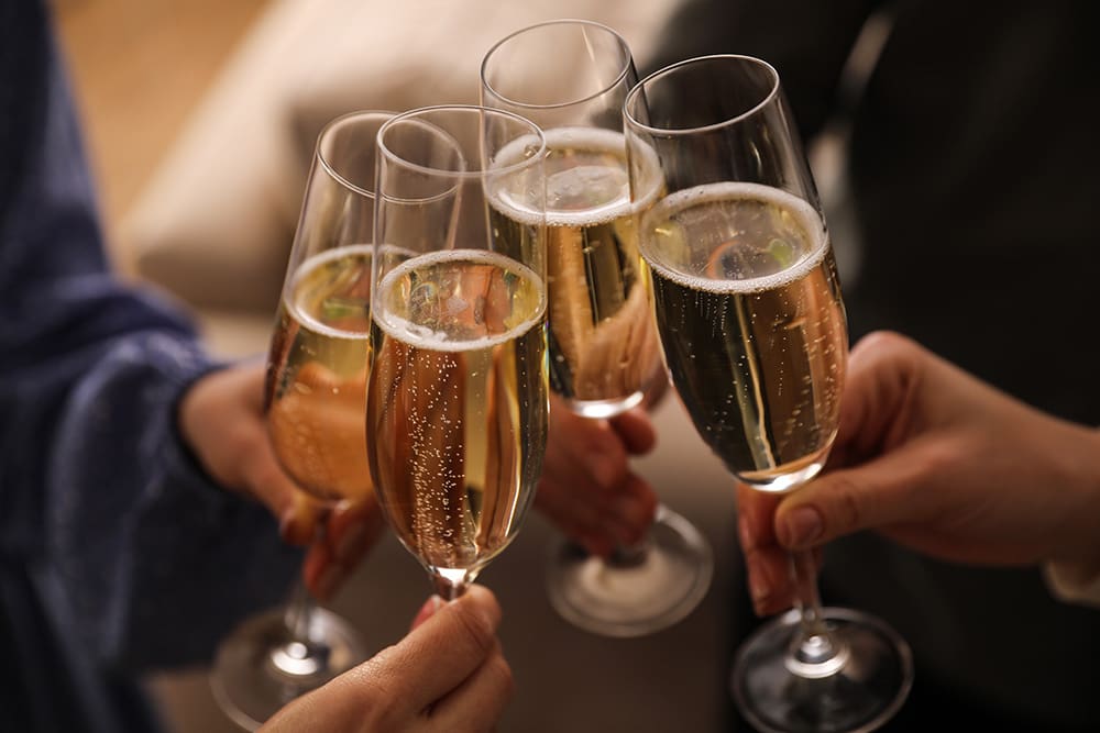 A group raising glasses of champagne in celebration